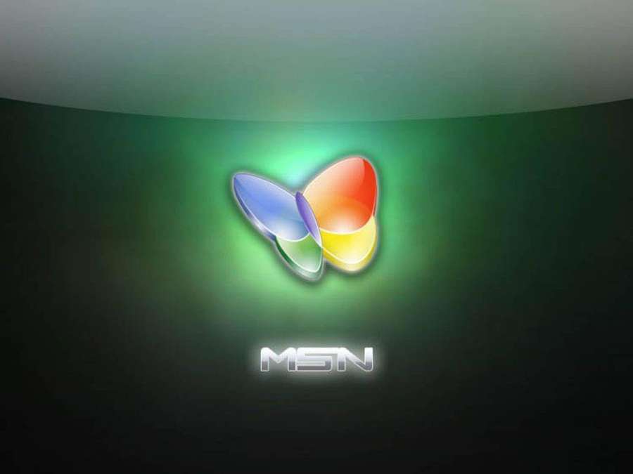 Glowing MSN logo with blue orange and yellow petals on dark green background. — Msn Wallpaper