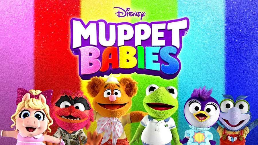 Enam karakter Muppet Babies tersenyum di depan latar belakang pelangi. — Muppet babies Wallpaper