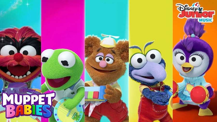Five cheerful Muppet Babies characters against rainbow-colored vertical stripes. — Muppet Background