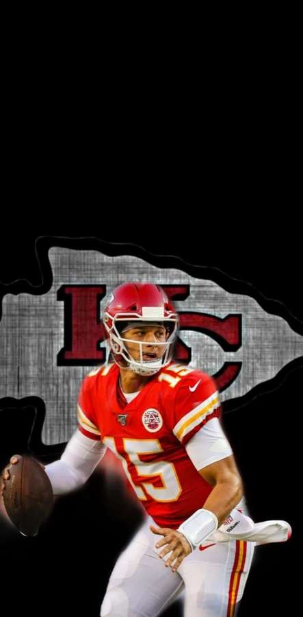 Football quarterback in red and gold uniform preparing to throw. — Patrick Mahomes Cool Wallpaper