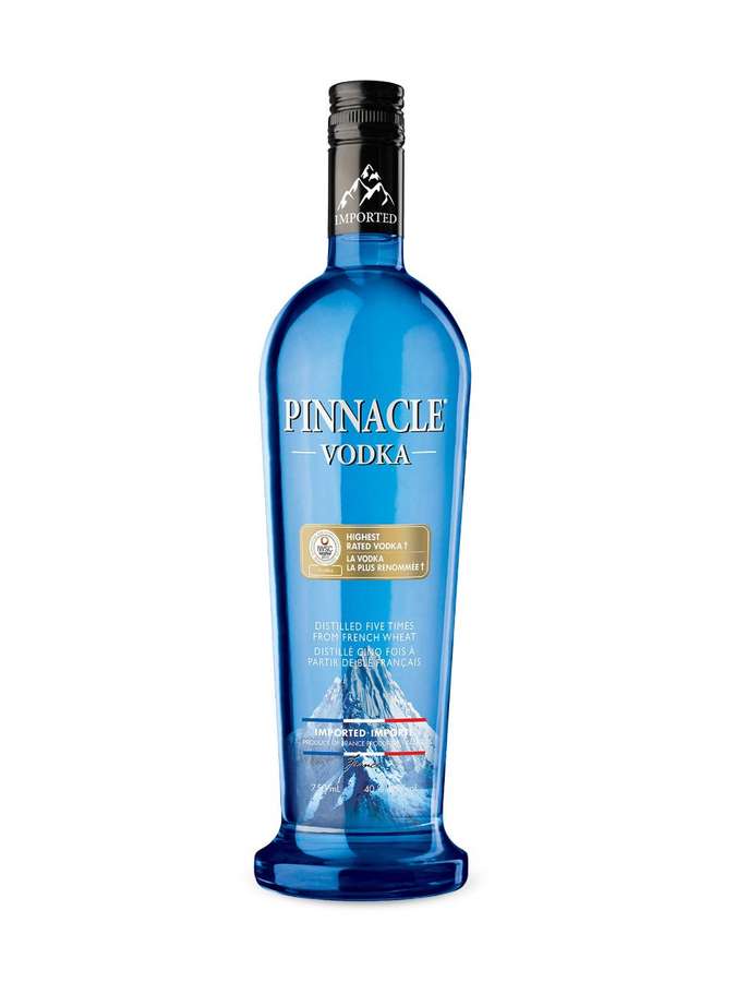 A blue bottle of Pinnacle Vodka with mountain imagery on the label. — Pinnacle Vodka Background