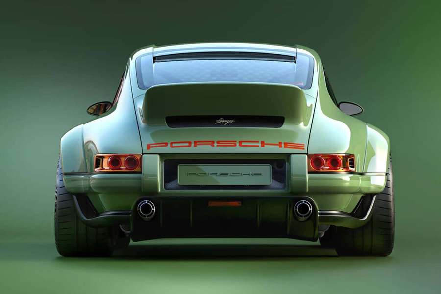 Takanäkymä vihreästä Porsche-urheiluautosta studioympäristössä. — Porsche 964 Taustakuvat