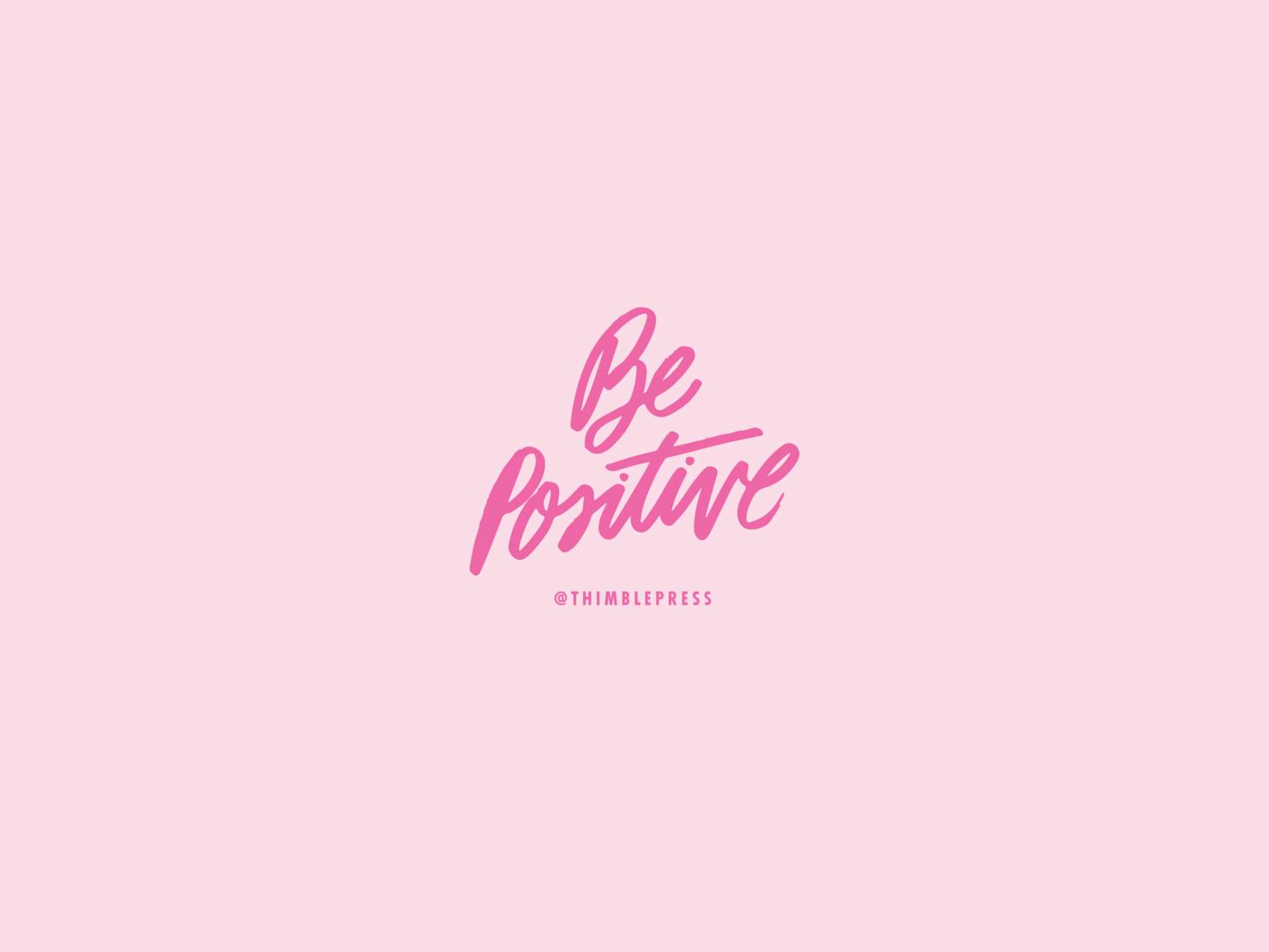 Pink cursive motivational quote saying 'Be Positive' on a light pink background. — Positive Background