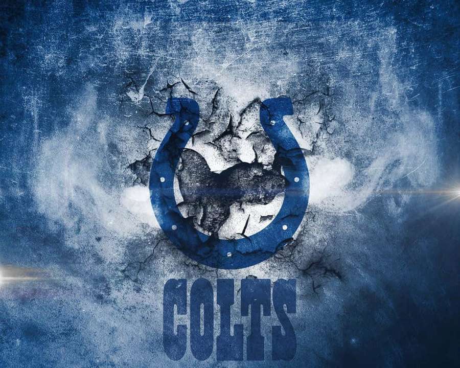 Logotipo azul do Colts com silhueta de porco rompendo gelo rachado com raios de luz. — Potros Papéis de Parede