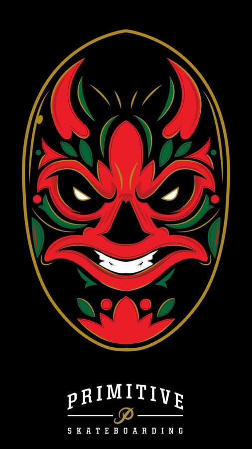 Máscara de demonio roja y verde con ojos brillantes y borde dorado sobre fondo negro. — Primitivo Fondos de pantalla