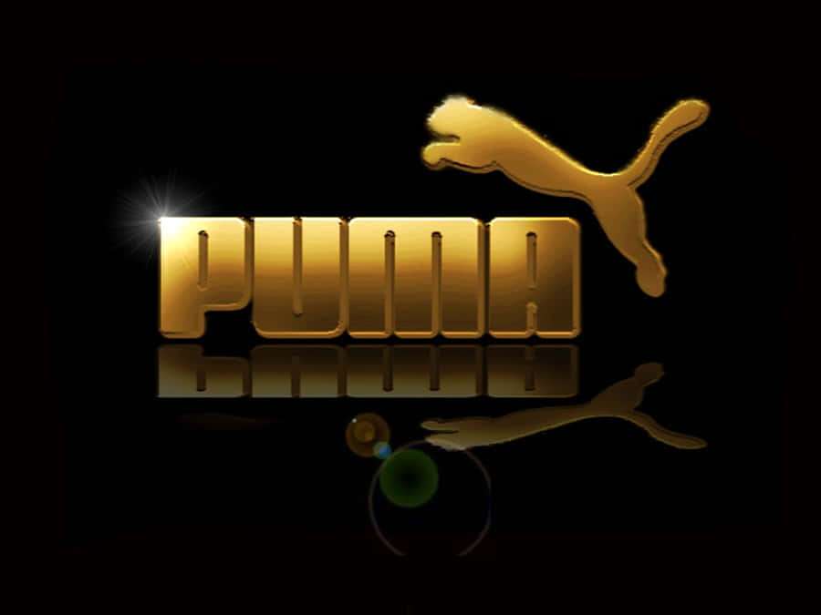 Golden Puma logo with leaping cat and reflection on black background. — Puma Background