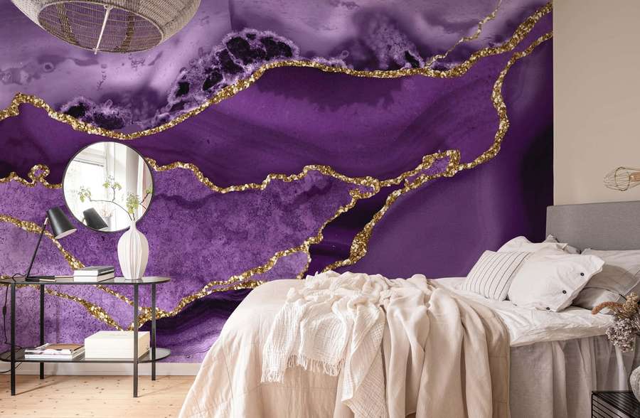 Purple and gold geode wallpaper in a modern bedroom with a bed and side table. — Purple Decor Wallpaper