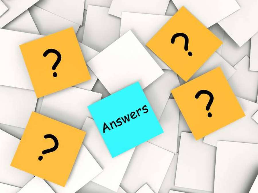 Blue sticky note with word answers surrounded by yellow sticky notes with question marks. — Questions Wallpaper