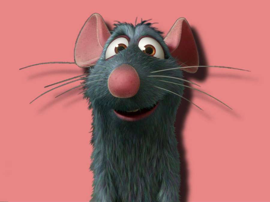 Eine blaue Cartoon-Ratte mit rosa Nase und Ohren, die vor rosa Hintergrund lächelt. — Ratatouille Bilder