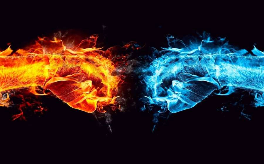 Two opposing energy streams one fiery orange one icy blue collide in a dark void. — Red And Blue Fire Background