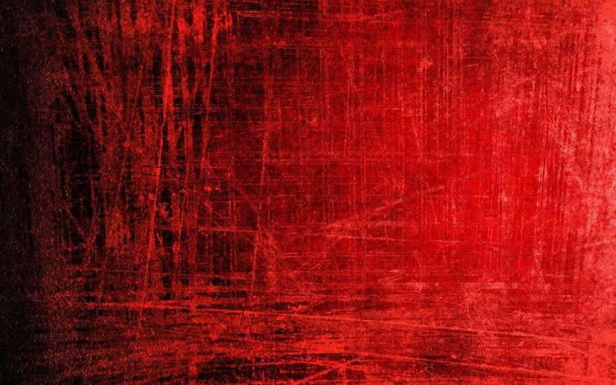 Gritty red textured background with dark scratches and streaks. — Red Screen Wallpaper