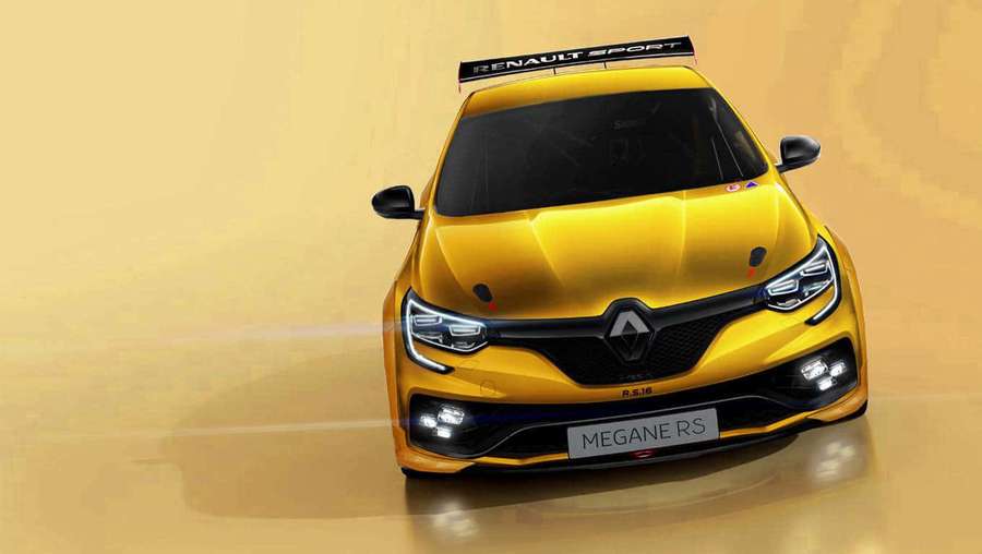 Yellow Renault Megane RS race car with black trim and rear spoiler. — Renault Rs16 Wallpaper