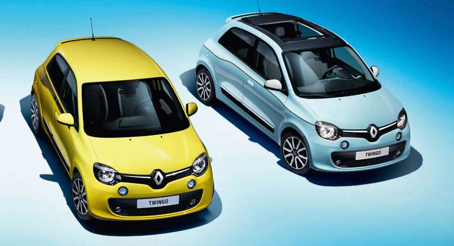 Two Renault Twingo cars yellow and light blue in studio setting — Renault Twingo Wallpaper