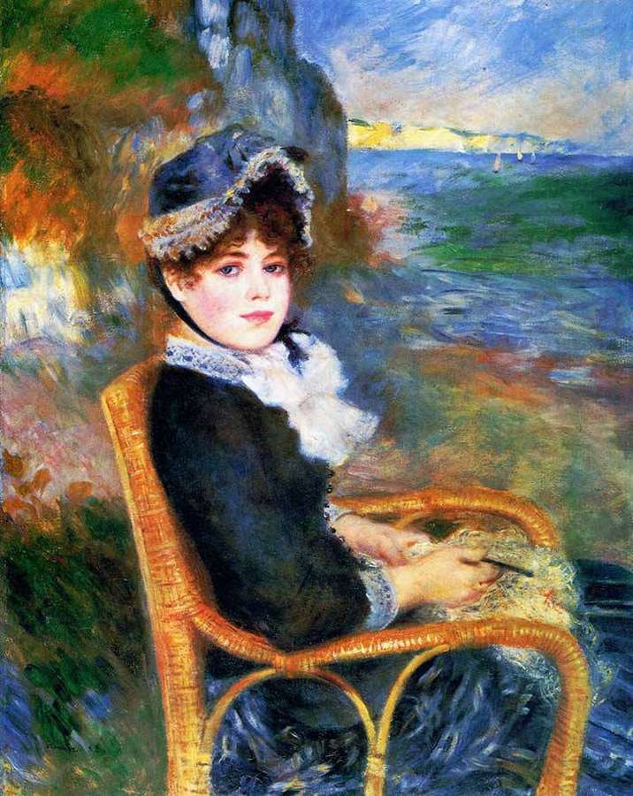 Woman in dark dress and hat seated in wicker chair by seaside — Renoir Background