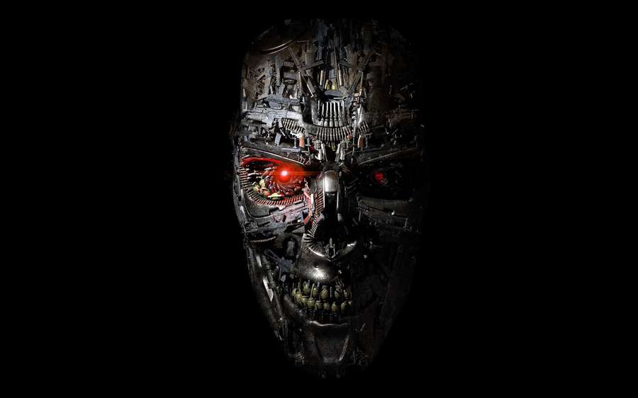 A menacing robotic face with glowing red eyes and exposed mechanical parts. — Robotech Picture
