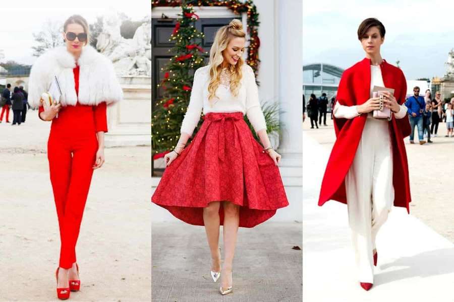 Tres mujeres con atuendos navideños rojos y blancos caminan al aire libre cerca de decoraciones navideñas. — Ropa Roja Fondos de pantalla