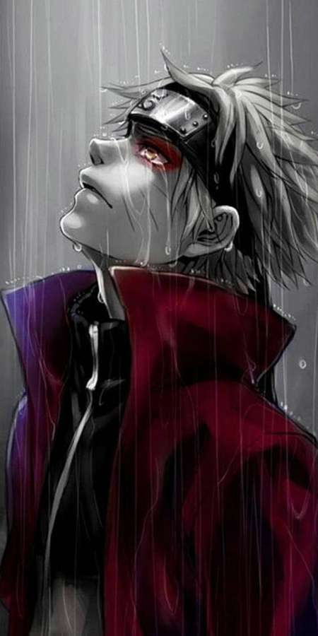 Anime character with red eyes and headband standing in rain wearing red cloak. — Sad Naruto Wallpaper