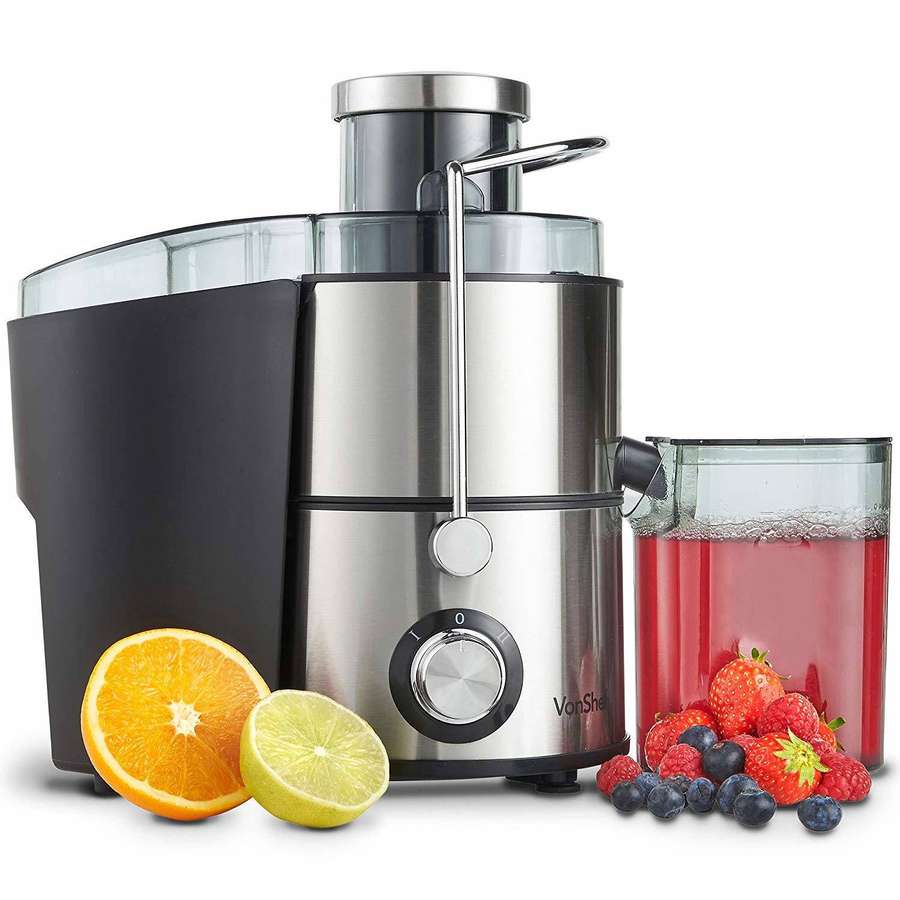 Edelstahl-Entsafter mit frischem Obst und einem Glas Beerensaft. — Saftpresse Wallpaper