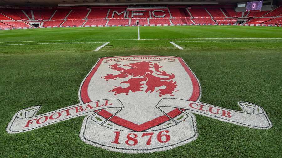 Middlesbrough Football Club crest painted on grass field in stadium. — Salisbury Picture