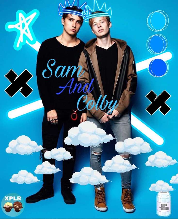 Two young men wearing crowns and casual clothes on a blue background with clouds and neon graphics. — Sam And Colby Wallpaper