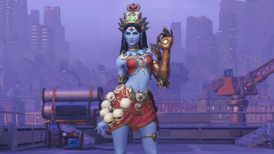 Blue-skinned goddess in ornate armor standing on a city rooftop with a purple haze. — Sanic Wallpaper