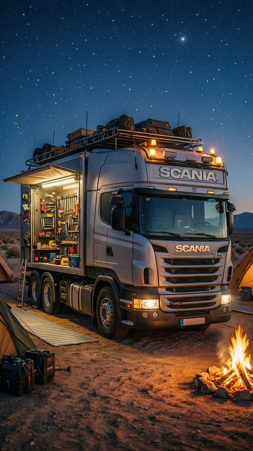 Scania overland truck with rooftop tent in desert campsite under stars. — Scania Picture