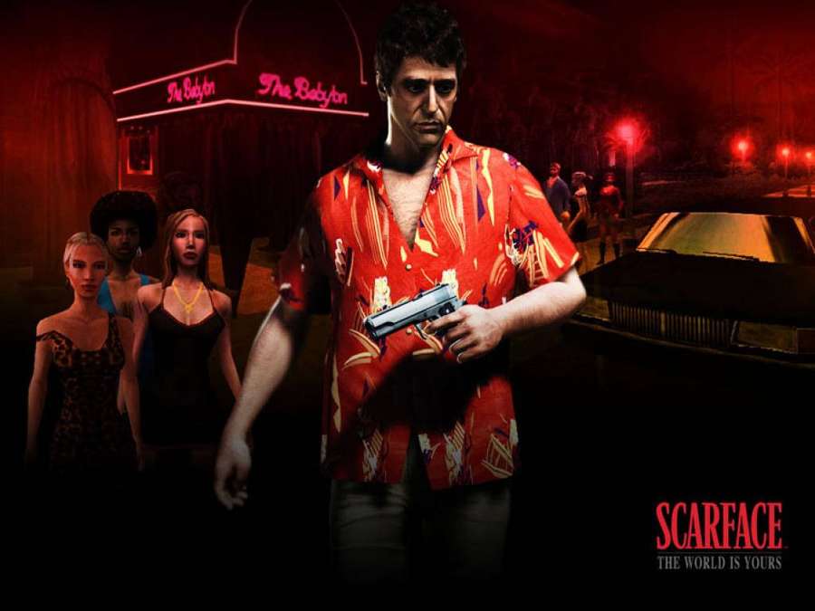 Scarface tiene una pistola con donne dietro di lui sotto luci al neon di notte. — Scarface Sfondi
