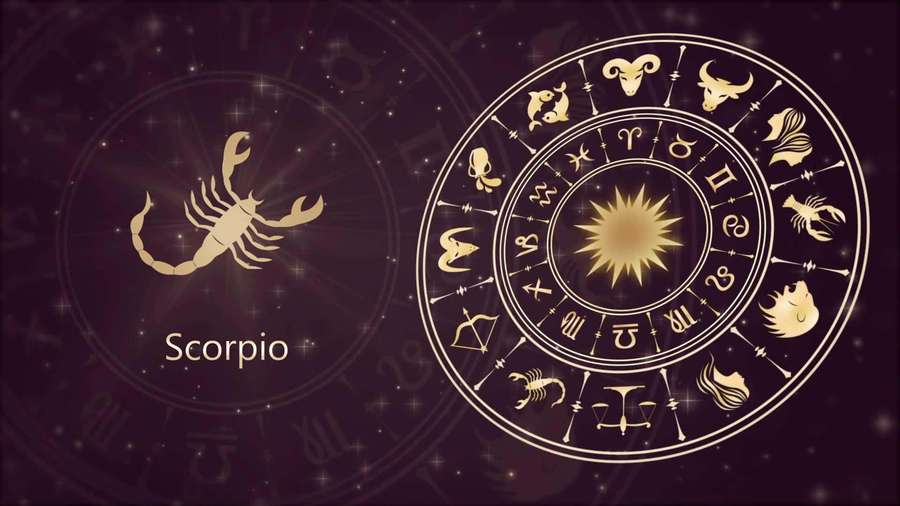 Zodiac wheel featuring Scorpio and all twelve signs glowing gold on a starry dark background. — Scorpio Background