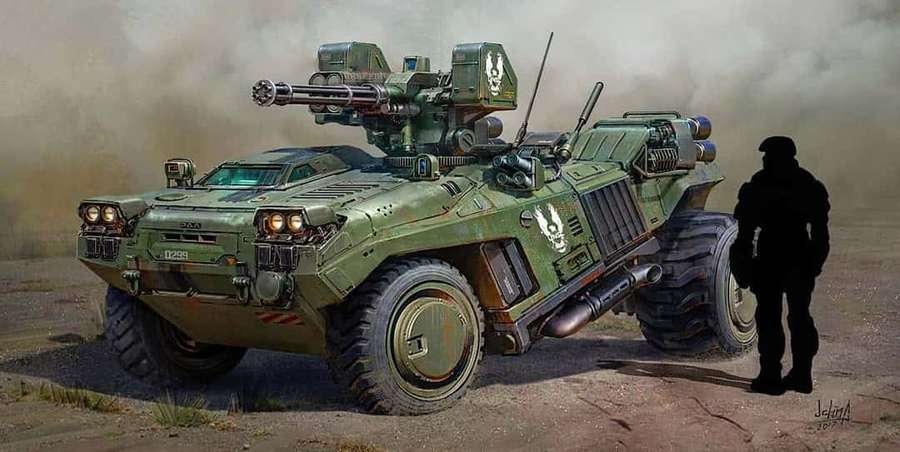 A soldier stands beside a military armored vehicle in a desert battlefield. — Scorpion Halo Wallpaper