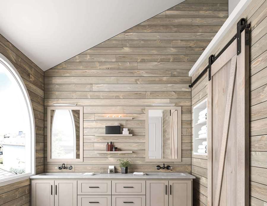 Modern rustic bathroom with wood walls, dual sinks, and sliding barn door. — Shiplap Picture