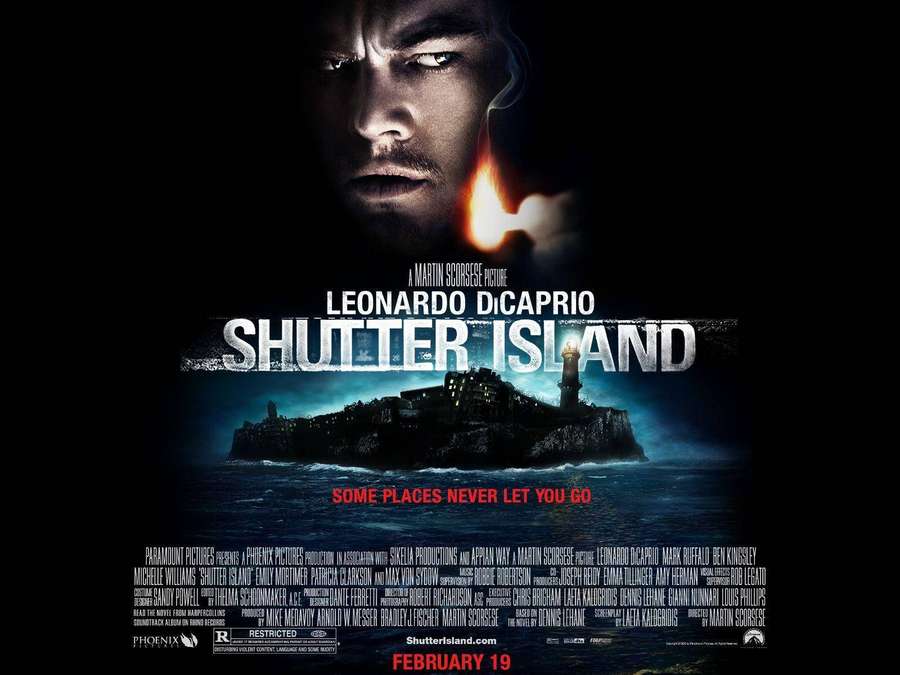 Leonardo DiCaprio stares intensely above a dark stormy island with a lighthouse. — Shutter Island Background