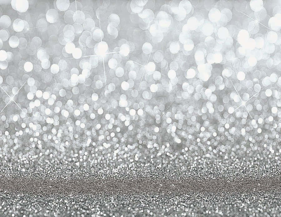 Silver glitter background with sparkling texture. Silver