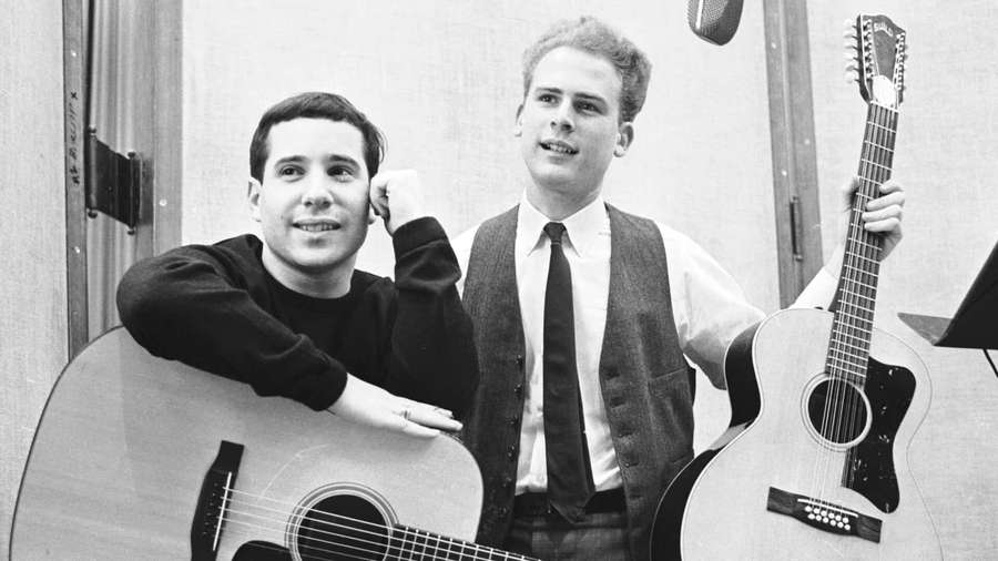 Two men holding acoustic guitars in a recording studio — Simon And Garfunkel Wallpaper