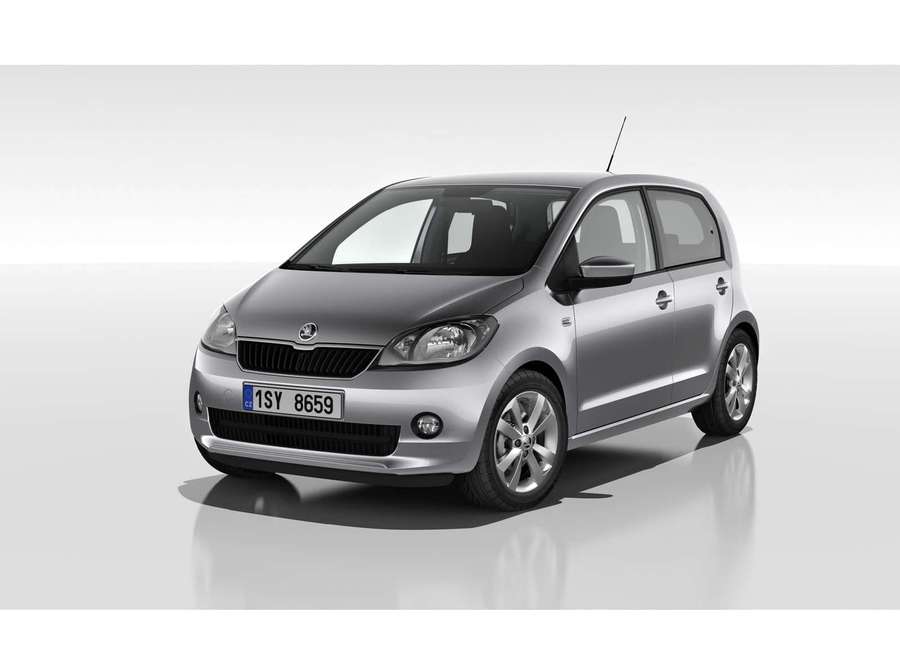 Silver compact car in studio with reflective floor and plain background. — Skoda Citigo Wallpaper
