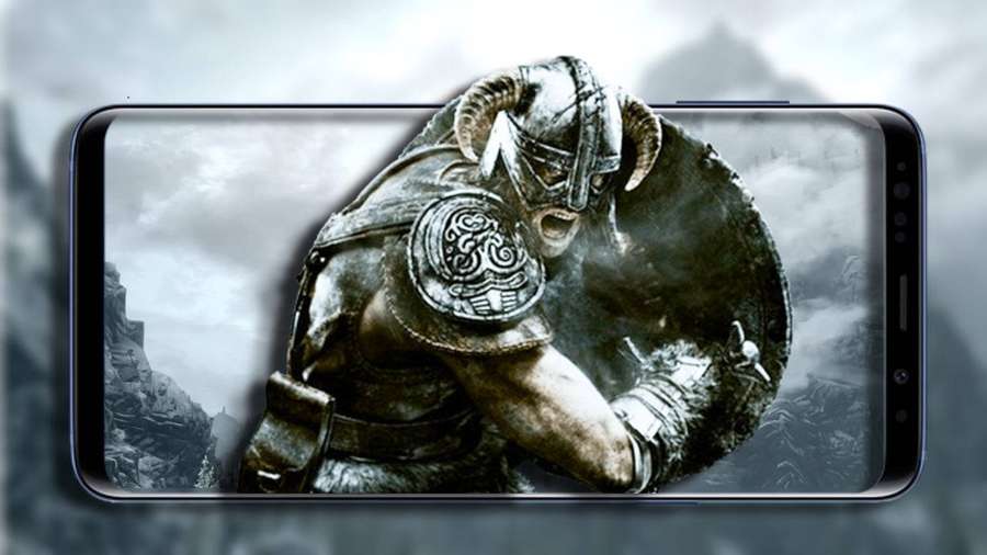 Soturi sarvikypärässä ja haarniskassa pitäen kilpeä älypuhelimen näytöllä. — Skyrim Puhelin Taustakuvat