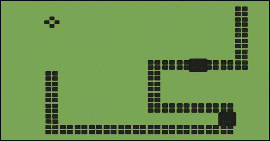 Pixelated black maze on green background with small cross marker. — Snake Game Background