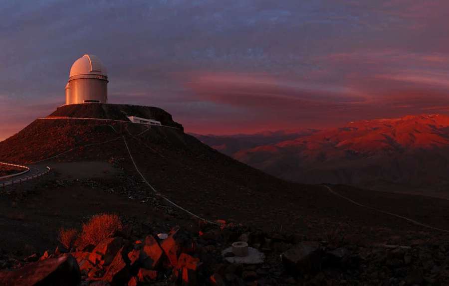 Observatory on mountain peak at sunset with red sky and distant snow-capped mountains — Space Observation Wallpaper