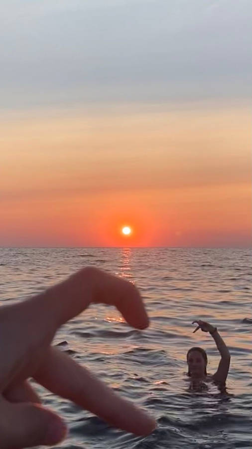 Spiaggia Al Calare Del Sole Sfondo