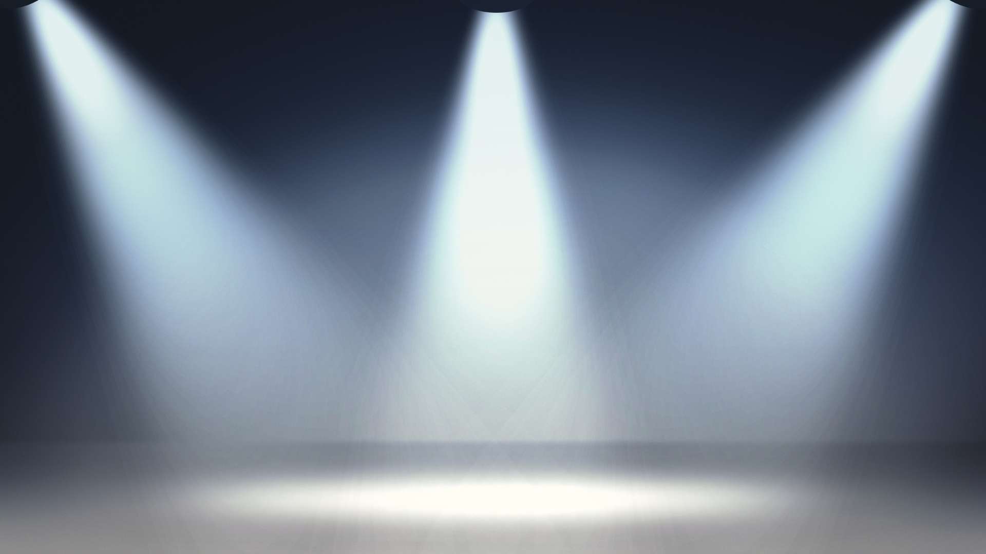 Three spotlights illuminate an empty stage floor in a dark room. — Spotlight Background