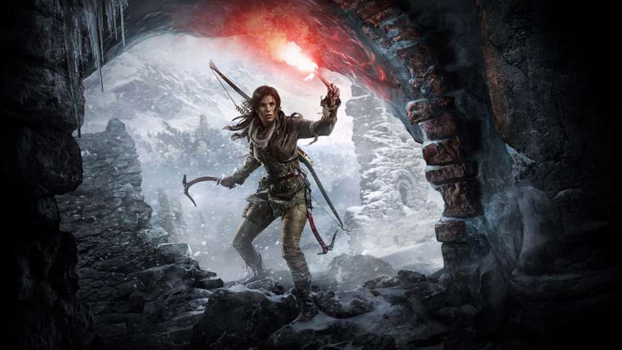 A warrior with torch and ice axe stands in a snowy mountain cave entrance. — Square Enix Wallpaper