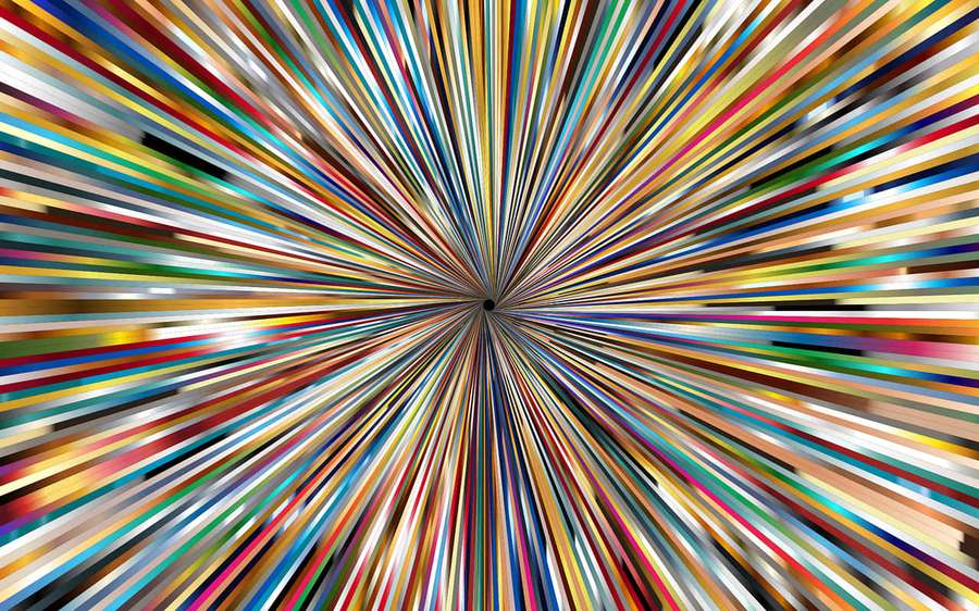 A burst of colorful lines radiating outward from a central point. — Starburst Background