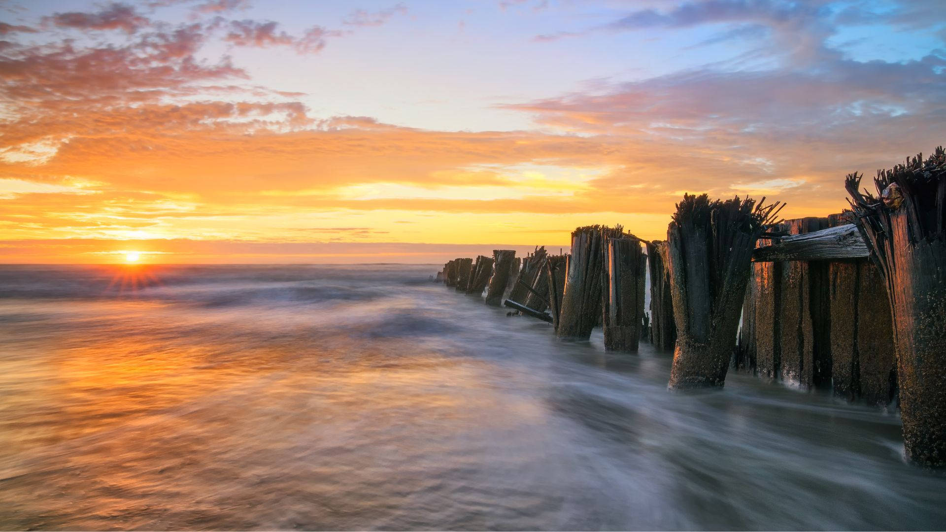 Strandzonsopgang Achtergrond