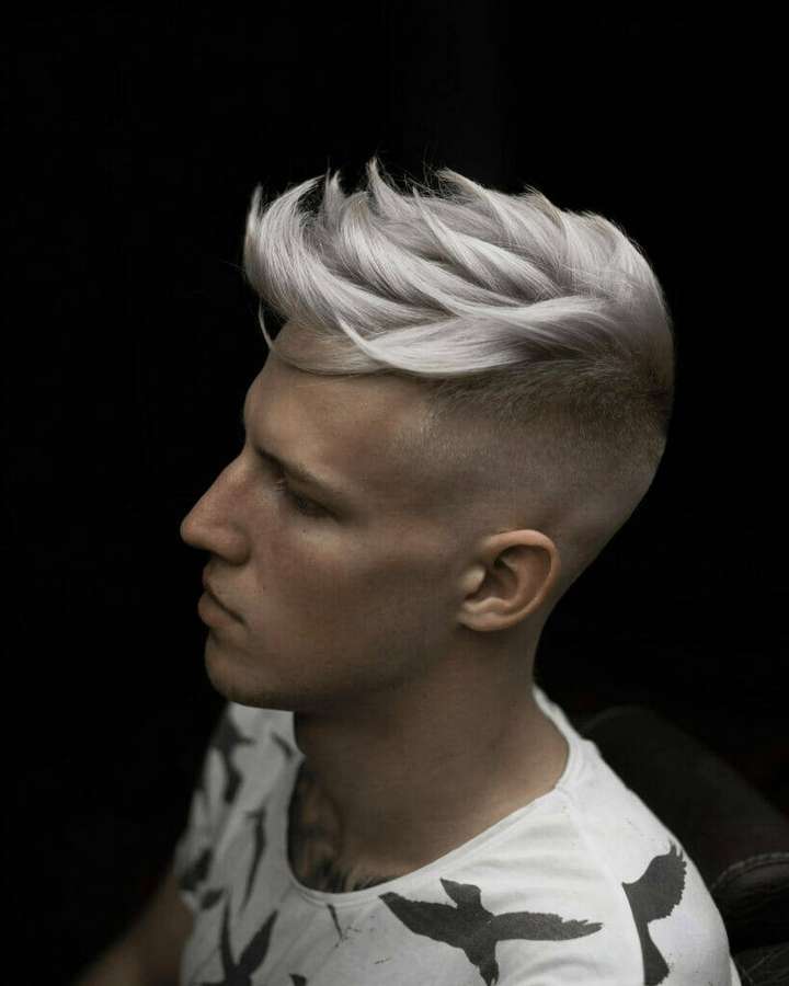 Man with silver fade haircut and bird tattoo wearing white shirt — Style Wallpaper