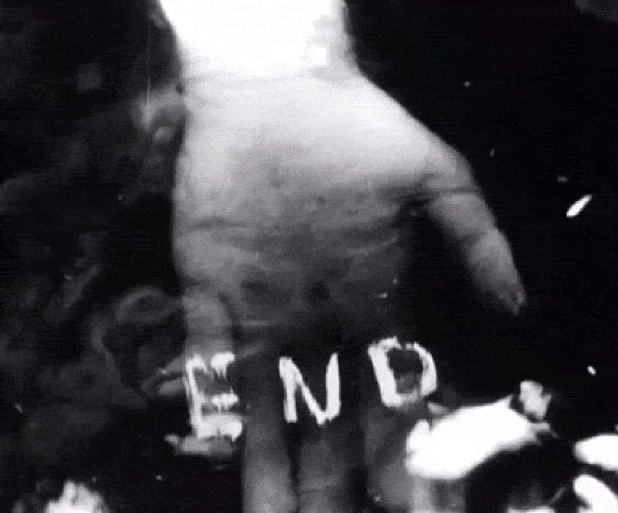 A hand with the word END written in chalk on its palm. — Suicide Wallpaper