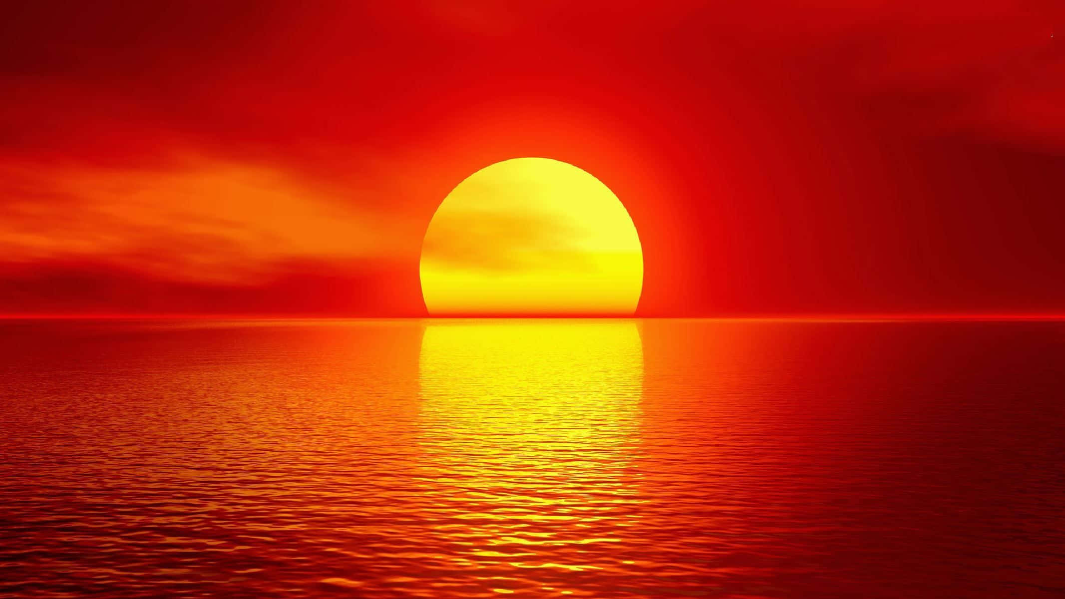 Un tramonto rosso vivido su acque oceaniche calme con un riflesso solare luminoso. — Sunset Sfondi