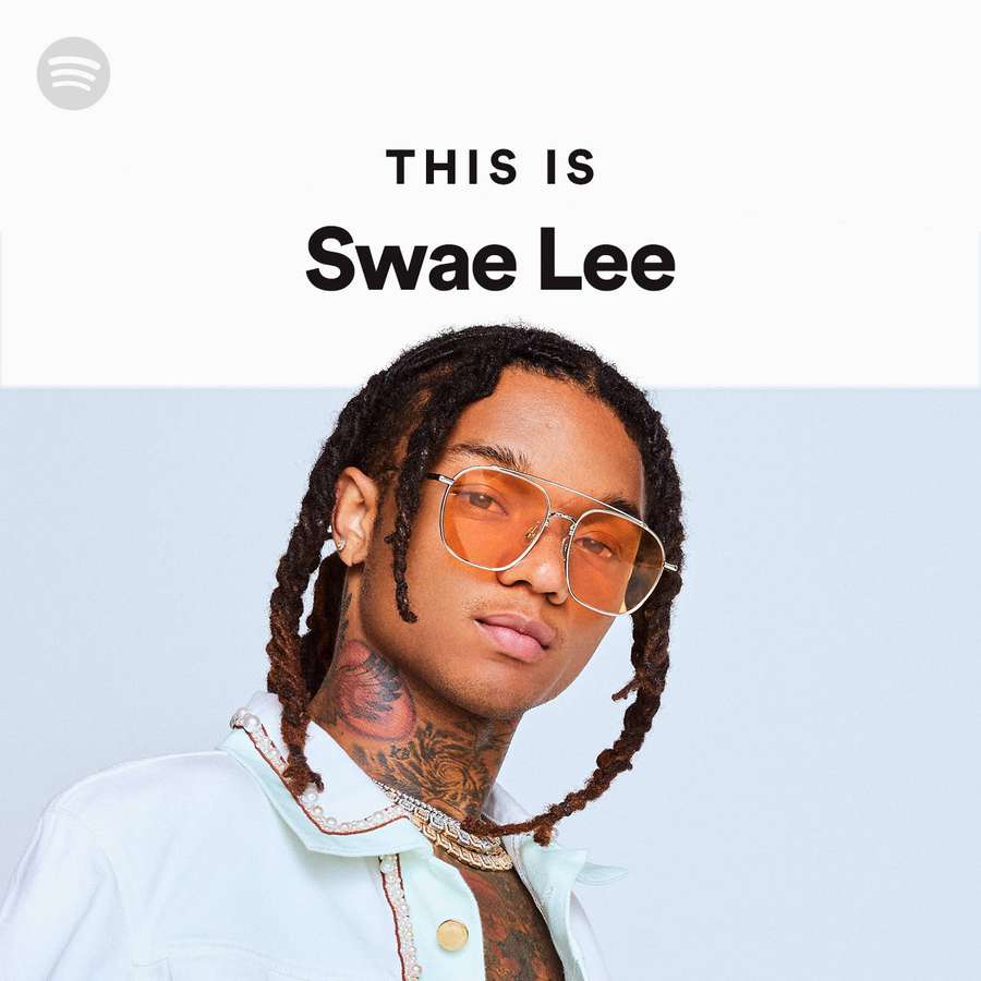 Swae Lee wearing orange glasses and a light blue shirt with tattoos visible. — Swae Lee Background