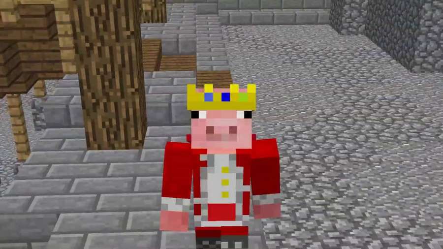A Minecraft pig character wearing a crown and red robe on a stone path. — Technoblade Wallpaper