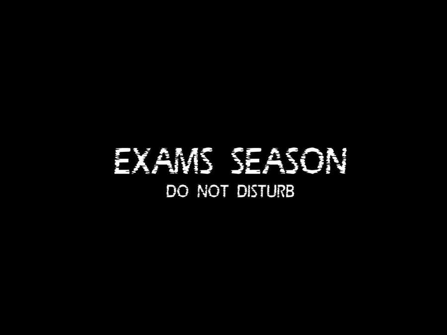 Black screen with white pixelated text saying exams season do not disturb. — Test Background