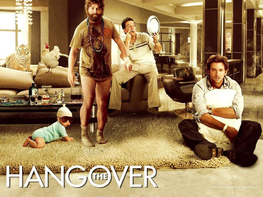 Three men and a baby in a messy luxury living room with a tiger and chicken. — The hangover Wallpaper