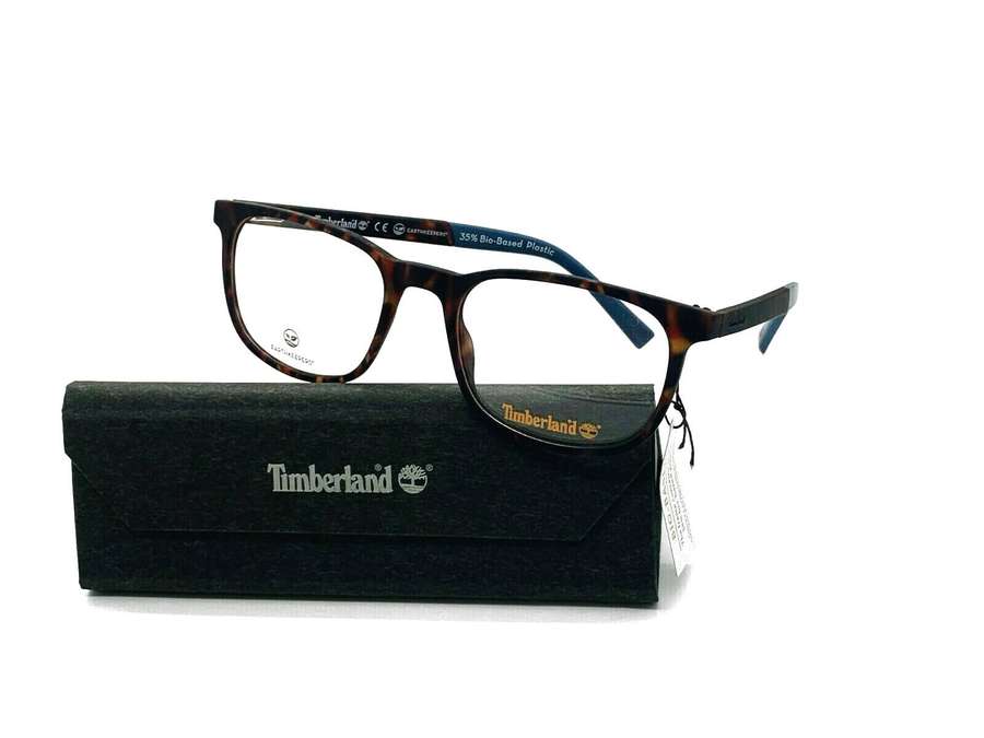 Timberland-silmälasit kilpikonnankuorikehyksillä ja sinisillä sankojen päillä mustalla kotelolla. — Timberland Taustakuvat